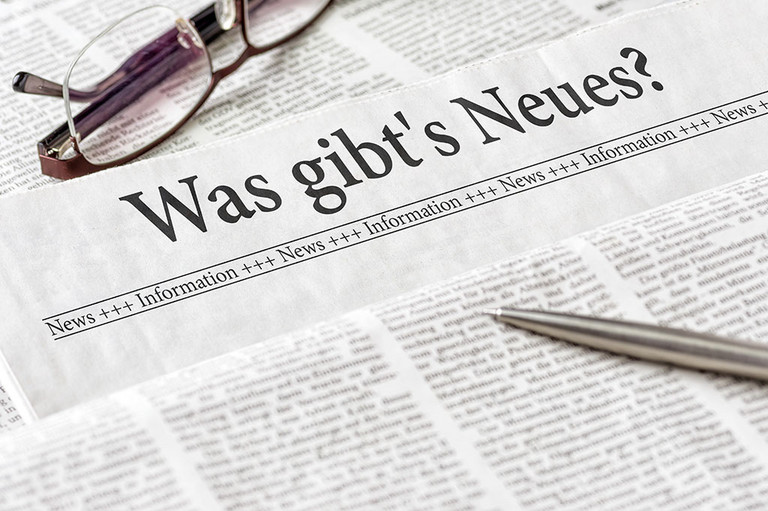 Zeitung mit der Überschrift Was gibts Neues?